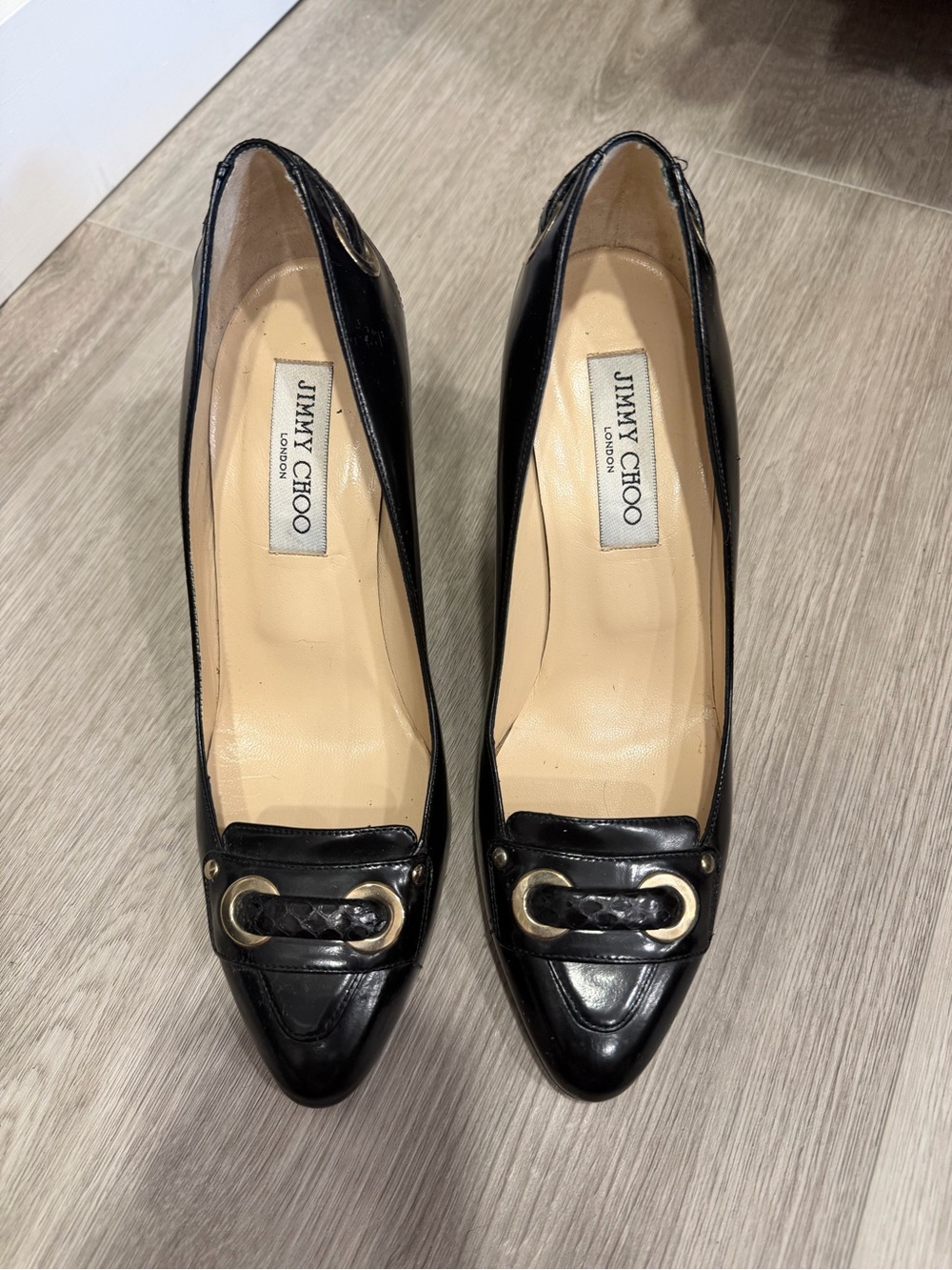 Jimmy Choo Black Leather Pointed-Toe Pumps with Gold Link Detail